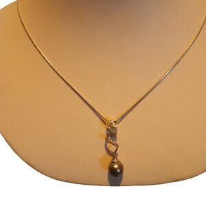 14k white gold chain with 14k titanium pearl with diamonds